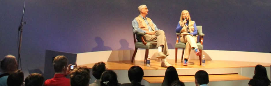 Image of E.O. Wilson on stage with a woman.