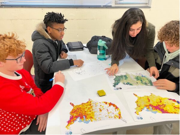 Students working on the Half-Earth map at Edison High School.