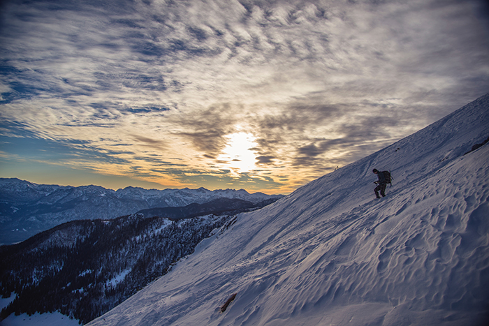 Image of a person on a snowy mountain.