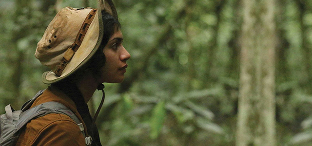 Image of a woman in the jungle.