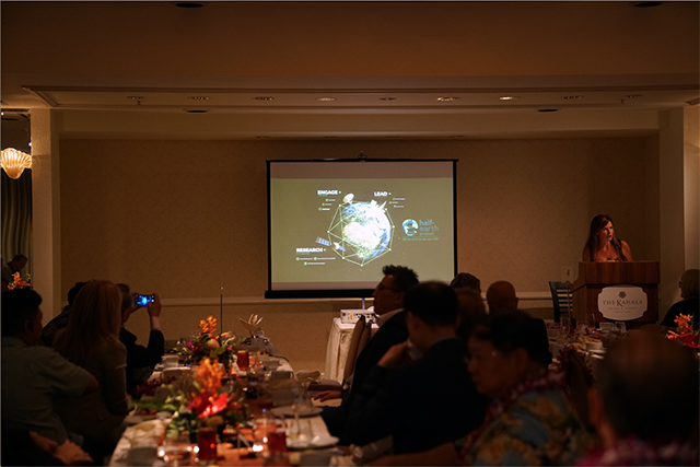 Image of Paula Ehrlich delivering the keynote address at the East-West Sustainability Summit.