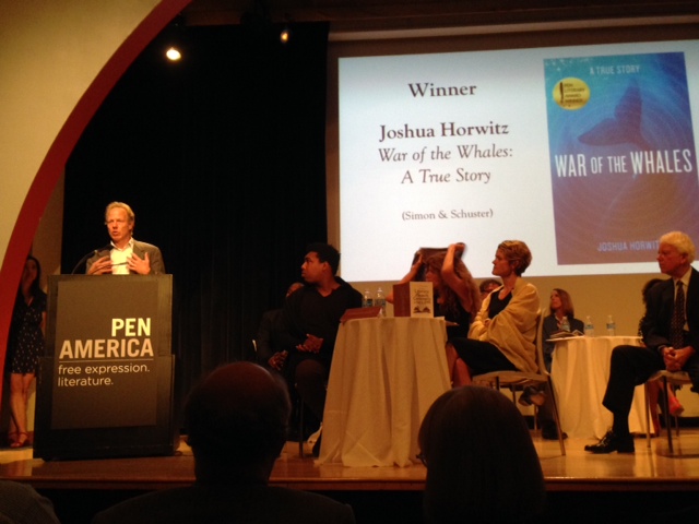 Image of Joshua Horwitz accepting an award for his book, War of the Whales. 