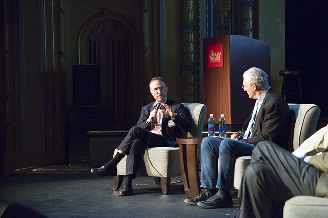 Image of Thomas Lovejoy and Louie Psihoyos on stage.