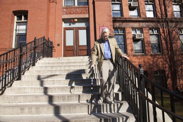 E.O. Wilson descending the steps of Harvard’s Museum of Comparative Zoology.