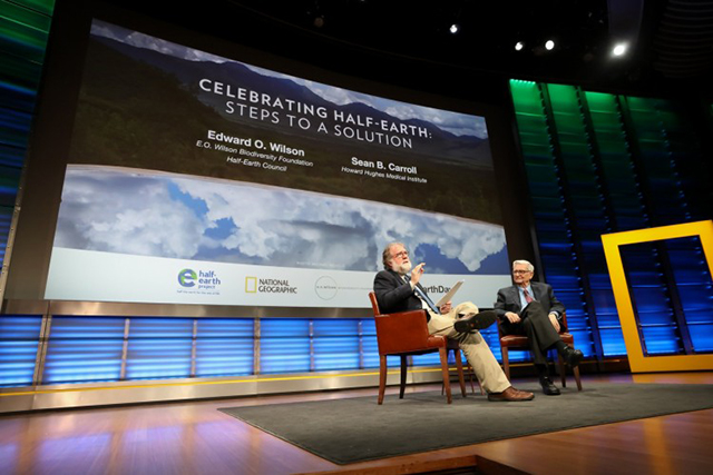 Scientist, author, and educator Sean B. Carroll (left) sits on stage with eminent biologist Edward O. Wilson (right) at the evening session of the planet’s first-ever Half-Earth Day. The inaugural event was co-convened by National Geographic and the E. O. Wilson Biodiversity Foundation and held at the National Geographic Society in Washington, D.C. on Oct. 23, 2017. Photo by Tony Powell/National Geographic.