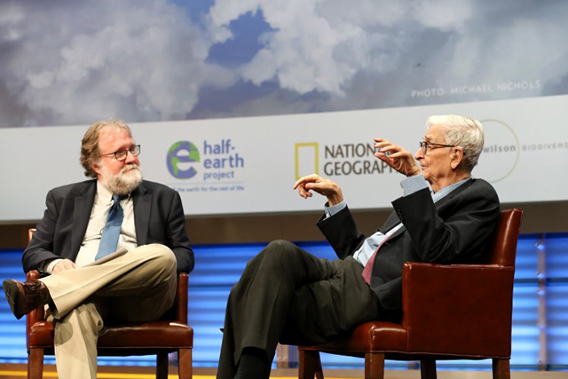 Scientist, author, and educator Sean B. Carroll (left) sits on stage with eminent biologist Edward O. Wilson (right) at the evening session of the planet’s first-ever Half-Earth Day. The inaugural event was co-convened by National Geographic and the E. O. Wilson Biodiversity Foundation and held at the National Geographic Society in Washington, D.C. on Oct. 23, 2017. Photo by Tony Powell/National Geographic.