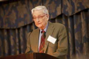 Image of E.O. Wilson speaking on stage.