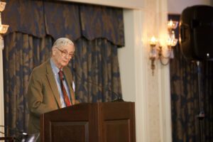 Image of E.O. Wilson speaking on stage.