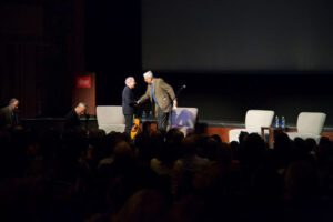 Multi-Grammy winner Paul Simon joins renowned biologist E.O. Wilson on stage in Durham. Photo by Chris Sims, E.O. Wilson Biodiversity Foundation.