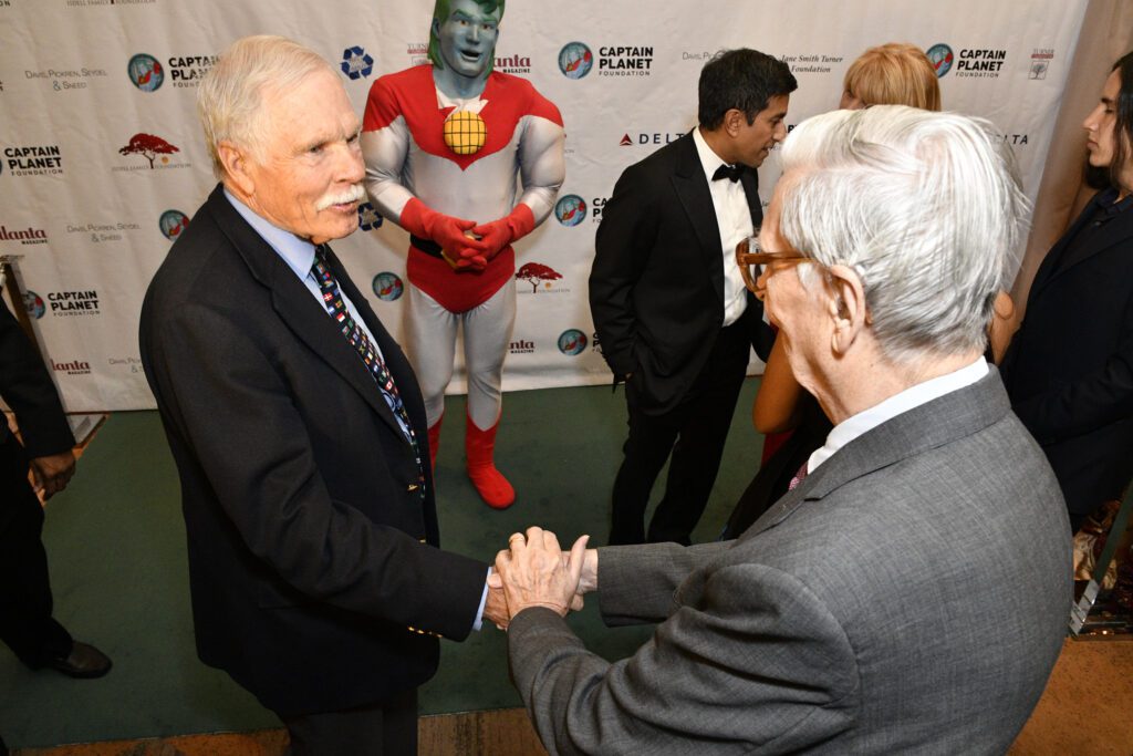 Image of Ted Turner, Captain Planet and E.O Wilson.