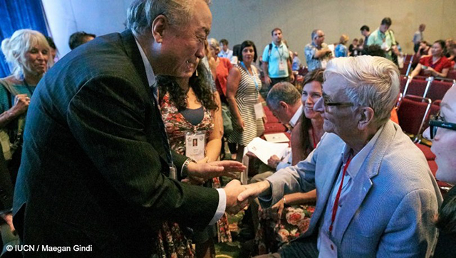 President of the IUCN, Mr. Zhang Xinsheng (left) congratulates E.O. Wilson following his keynote address at the Opening Forum of the IUCN World Conservation Congress 2016.