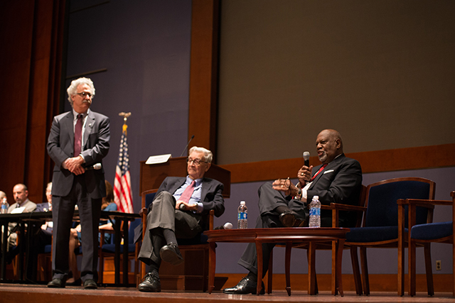 Image of E.O. Wilson on stage with several other people.