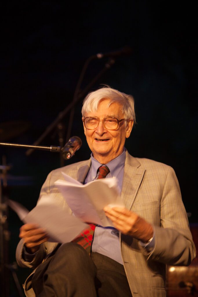 Image of E.O. Wilson sitting on stage.