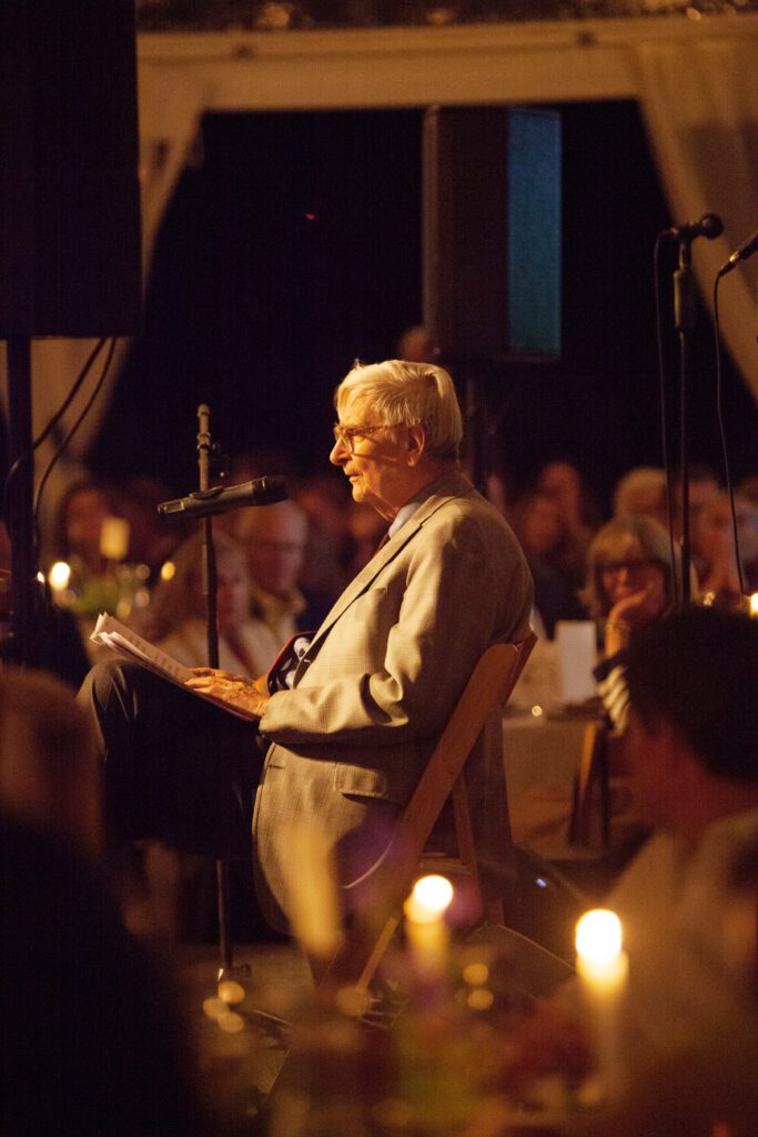 Image of E.O. Wilson sitting on stage.