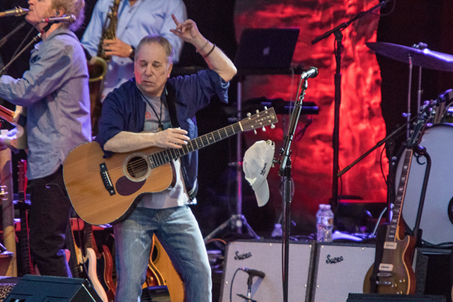 Photograph by Alex Carson. Paul Simon performing in Charlotte, NC concert. From Clture.org. June 8, 2017.