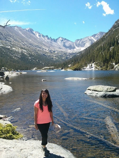 Imagine of Sahil Chaini in front of mountains and a stream. 