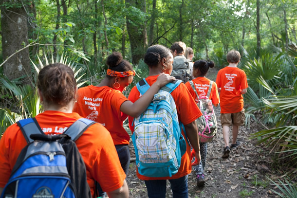 Image of kids walking in a line.