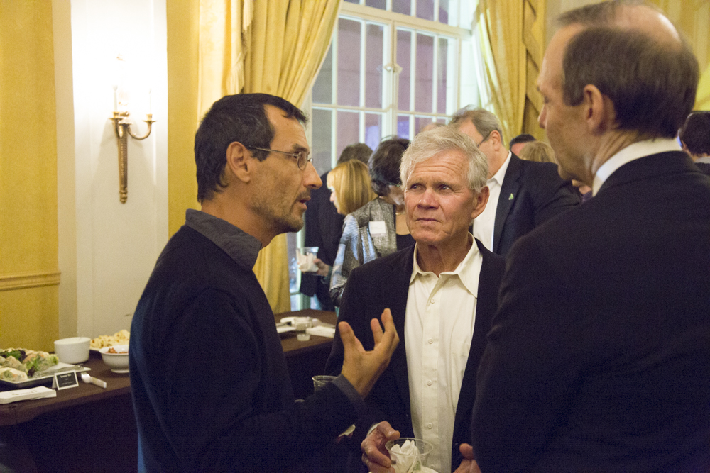 Image of three people standing together.