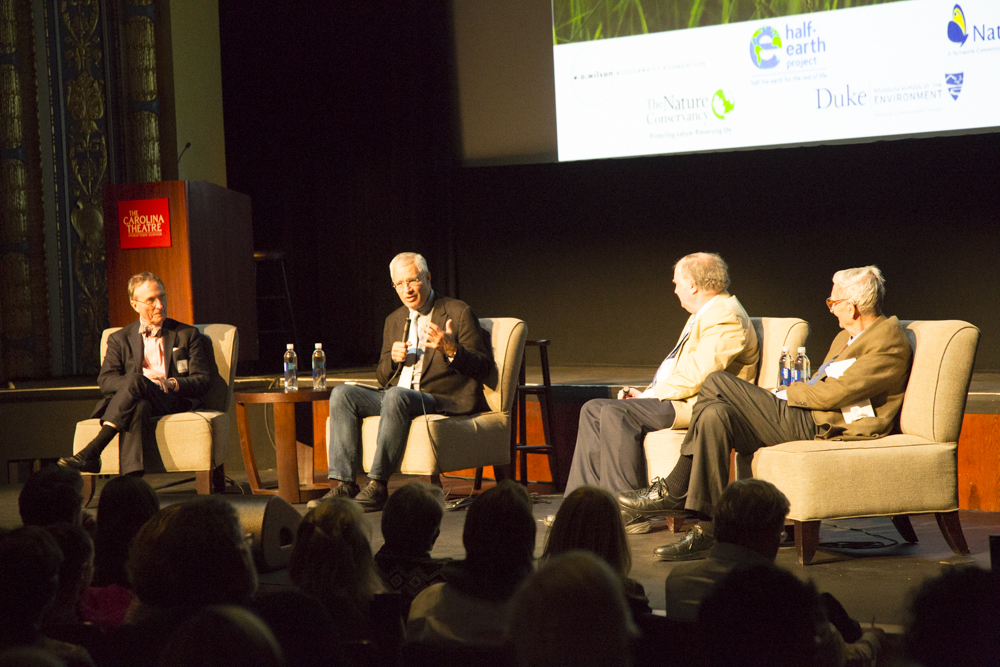 Image of Thomas Lovejoy, Louie Psihoyos, John Seager and Edward O. Wilson on stage.